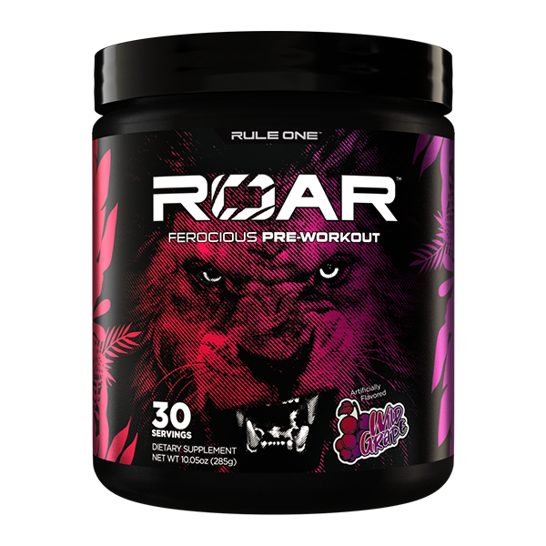 A black Rule One R1 Roar Ferocious Pre-Workout container features a bold purple and pink lion face, offers 30 servings of wild grape flavor, and is designed to boost workout intensity as a powerful training supplement.